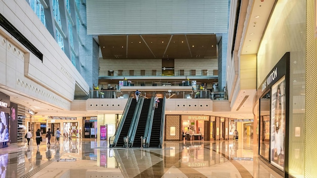 the lobby of a building with a sign that says quot escalator quot