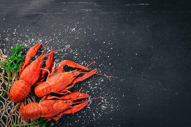 Lobster Seafood On a wooden background Top view Free space for your text