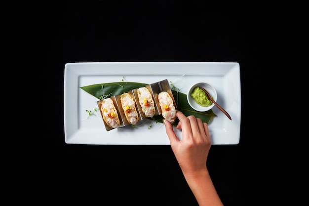 Foto ricetta tacos di aragosta con la mano