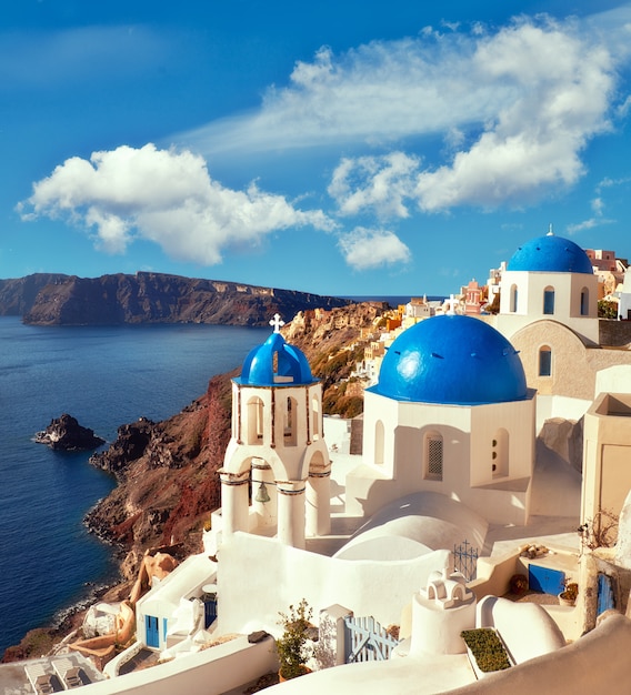 Local church with blue cupola in Oia village in Santorini