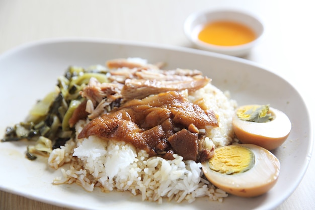 Local thai food stewed pork leg on rice