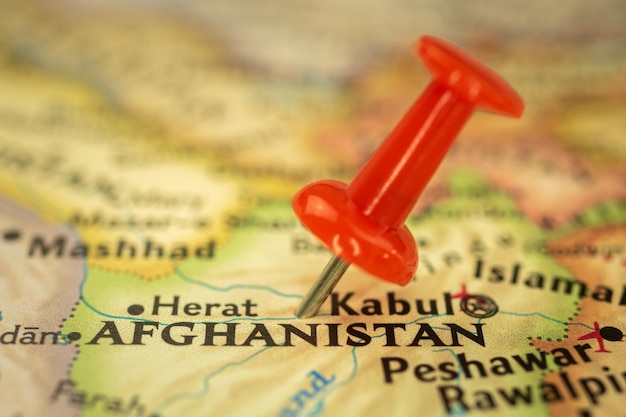 Location afghanistan travel map with push pin point marker\
closeup asia journey concept