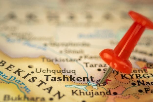 Location Tashkent in Uzbekistan travel map with push pin point marker closeup Asia journey concept