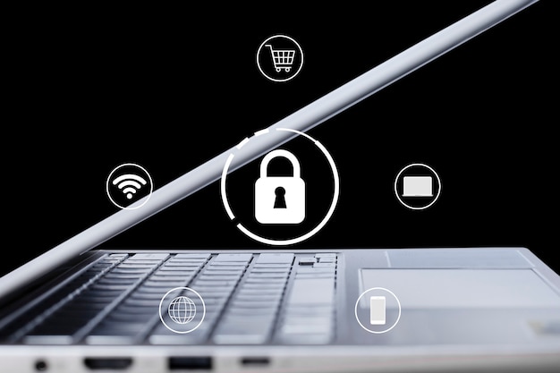 Foto bloccare la tecnologia di sicurezza icona con un computer portatile su sfondo nero