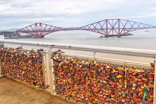 Photo locked in love padlocks overlooking forth bridge