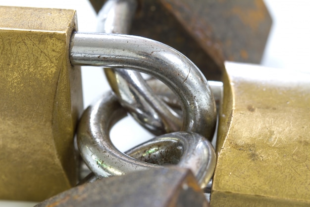 Locked padlock over white background