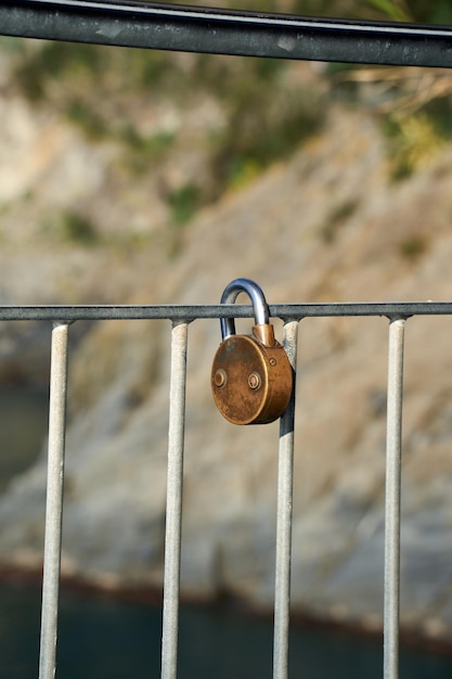 Photo locked tethered by metal chain and padlock