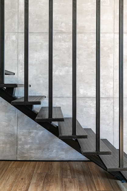 Loft minimal interior with metallic staircase