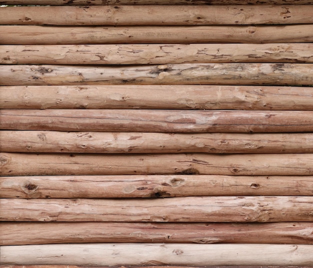 Log cabin barn unpainted debarked wall textured horizontal background