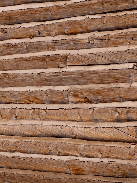 Log cabin wall on old farm.