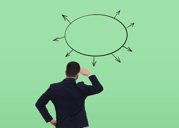 Logic Man standing in front of diagram on pale green background back view