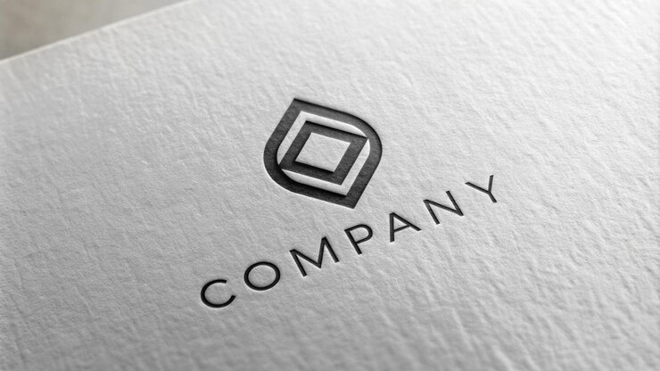 Photo a logo for company company that is on a white paper