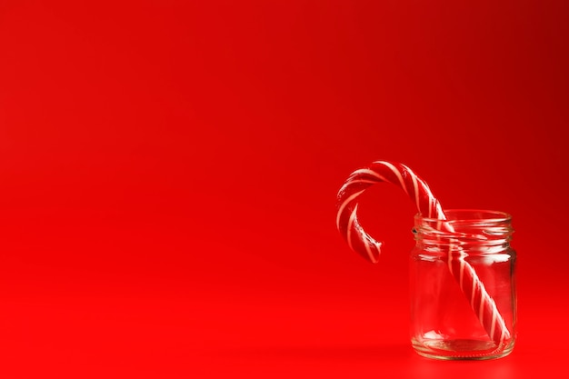 Lollipop candy cane in a glass jar