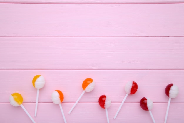 Lollipops on pink background. sweet candy.