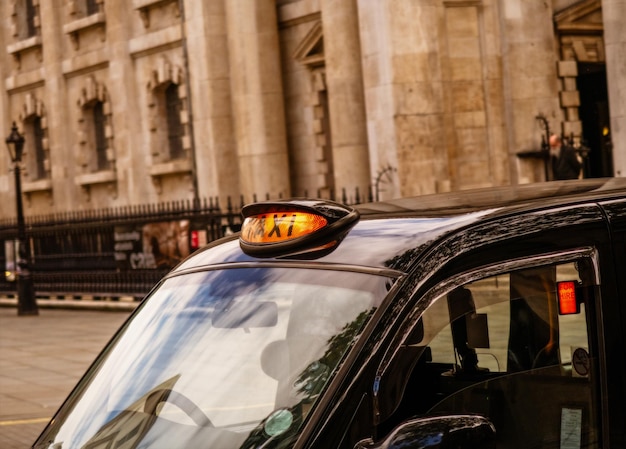 London black cab taxi for hire around Trafalgar Square, London.

May 2019