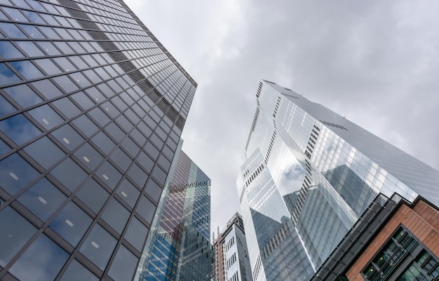 London reflection of clouds in the windows of modern buildings