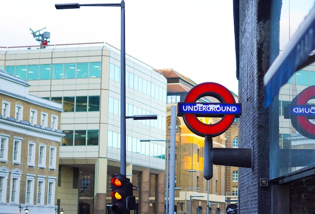 LondonLondon Bridge stationUK20022023Red and blue circle sign of london underground in uk