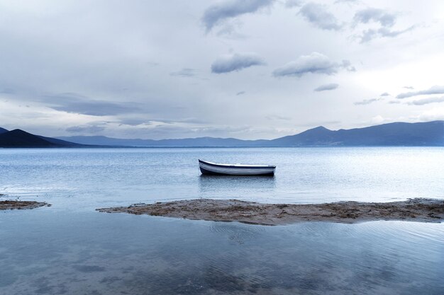 Lonely boat on lake prespa north macedonia