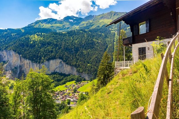 Lonely house near mountain village Lauterbrunnen, Bernese Oberland, Switzerland.