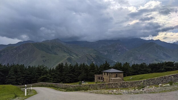 Lonely road to the forest and mountains