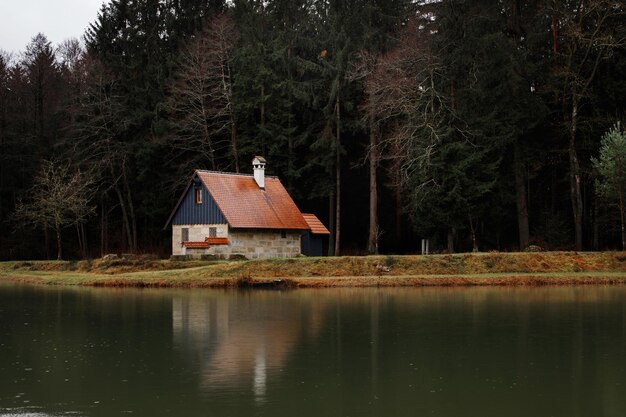 Lonely Stone House by the Forest Lake