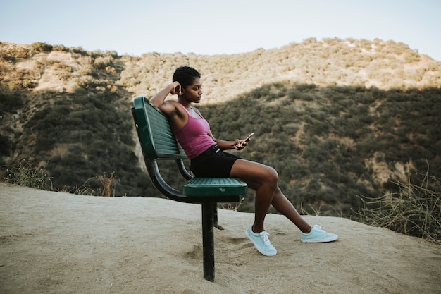 Lonely woman checking her phone