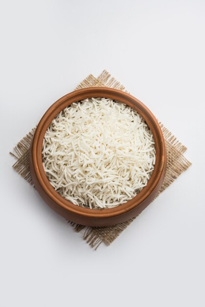 Long Basmati Rice in cooked form is an Indian main course food, served in a bowl. selective focus