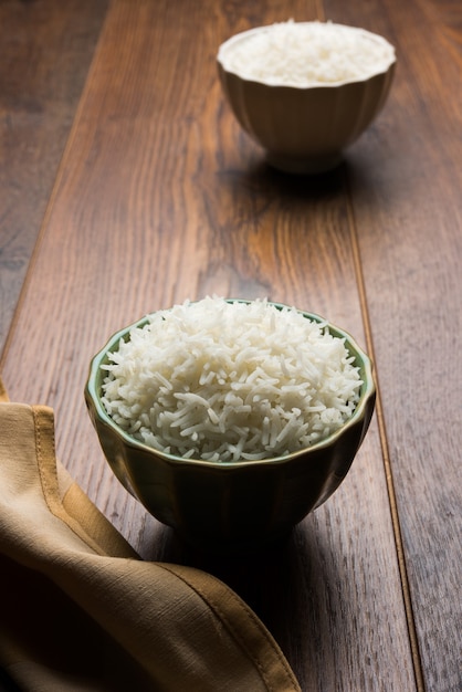 Long Basmati Rice in cooked form is an Indian main course food, served in a bowl. selective focus