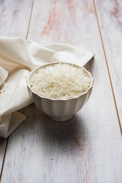 Long Basmati Rice in cooked form is an Indian main course food, served in a bowl. selective focus