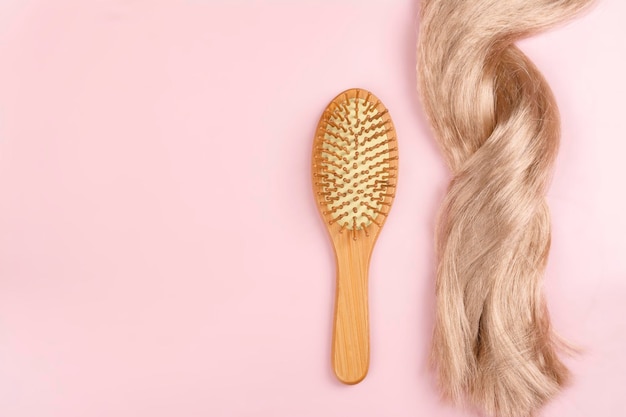 Long blond hair with sakura flowers in it International Hair Day Bad Hair Day Copy space