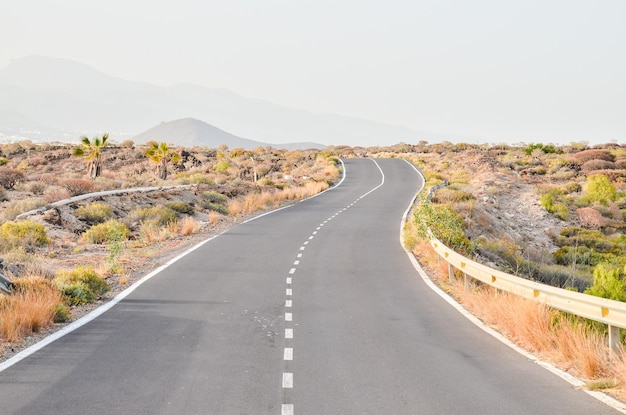 Long Empty Desert Asphalt Road in Canary Islands Spain