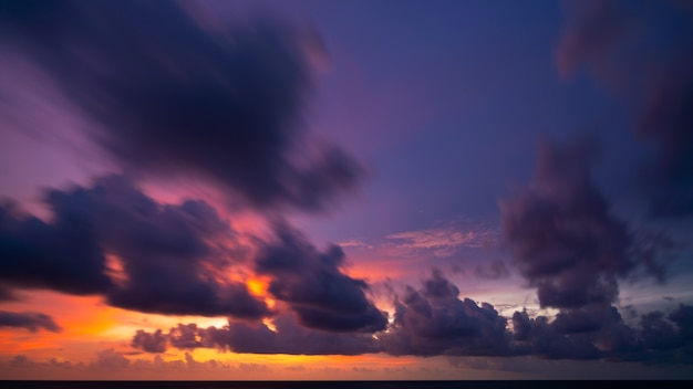 Long exposure Colorful sky sunset or sunrise Burning colourful sky Beautiful light reflection on sea surface Amazing landscape or seascape nature background.