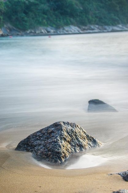 Long exposure details of the red beach of Urca in Rio de Janeiro Brazil