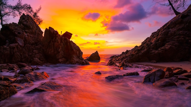 Long exposure image of Dramatic sky seascape with rock in sunset scenery background Amazing light nature landscape.