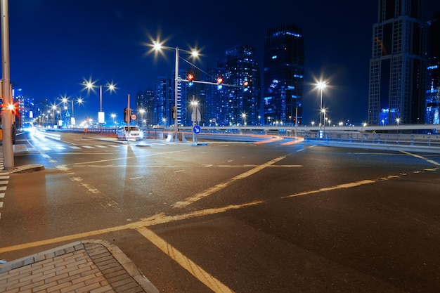 Long exposure of moving cars on night road in dubai