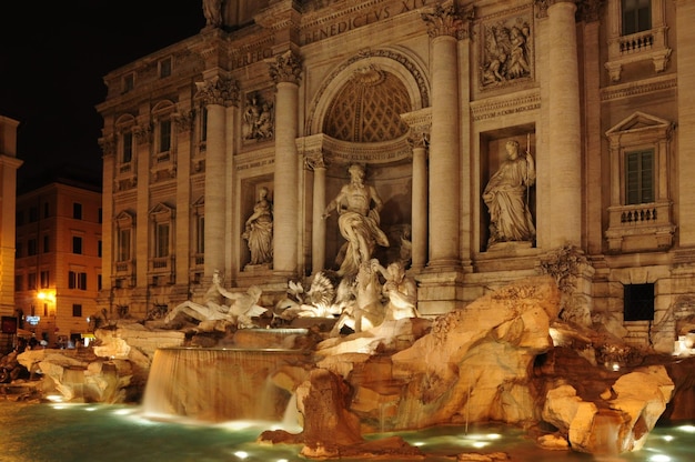 Long exposure of the Trevi Fountain illuminated at night Rome Italy