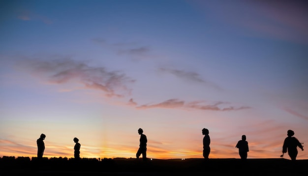 Long exposure of twilight sky and people silhouette