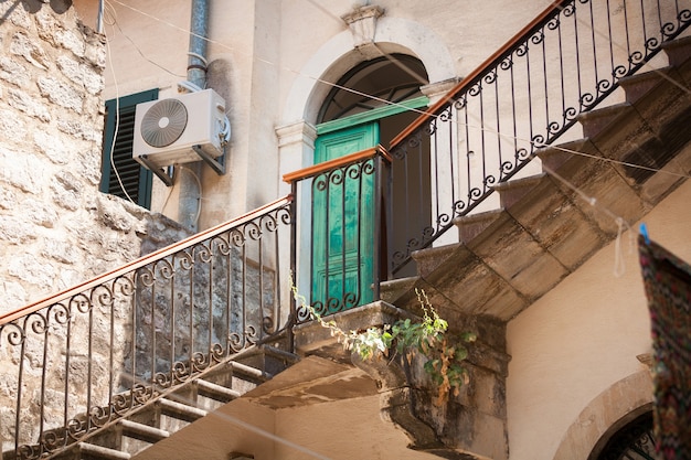 Long flight of old stone staircase at backyard of old town