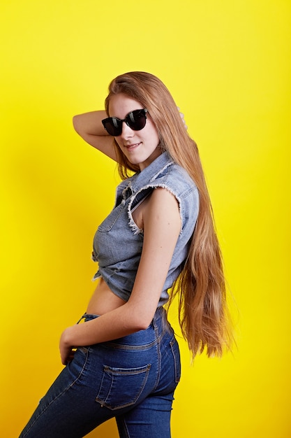 Long hair girl yellow background