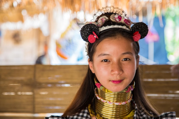 Long neck lady. Kayan Lahwi tribe known for wearing neck rings, brass coils to extend the neck.