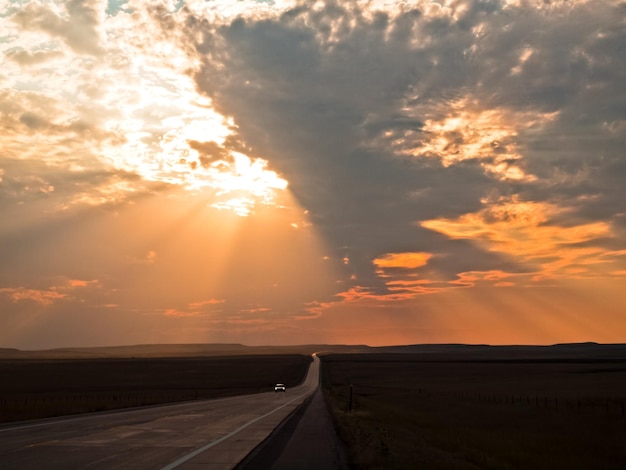 Long road at the sunset in South Dakota.