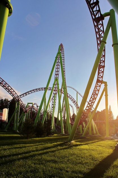 A long shadow from the roller coaster at sunset