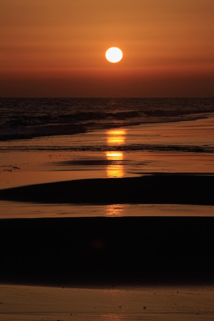 long shot of an amazing sunset over the Atlantic ocean