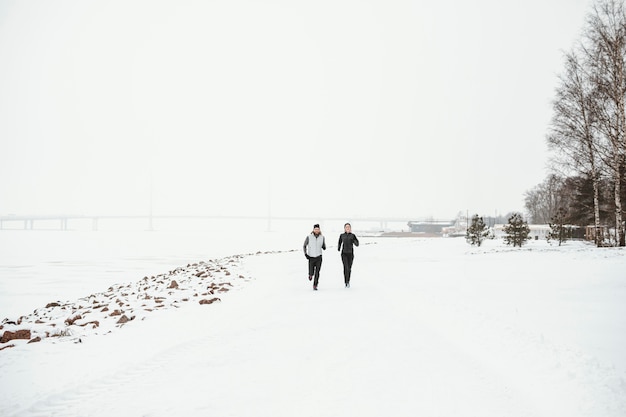 long shot people running in nature