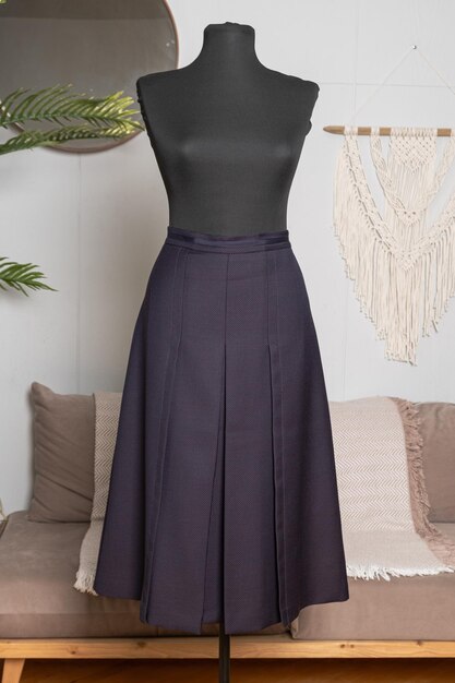 Long skirt with pleats on a tailors mannequin