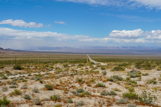 long small road in the middle of the desert in Arizona California USA