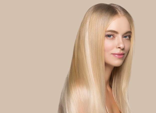 Long smooth hair beauty woman portrait blonde hairstyle healthy hair skin. Color background. Brown.