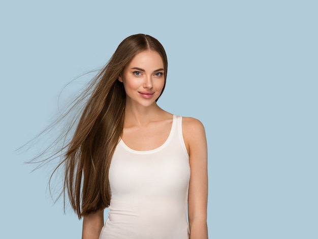 long smooth hair woman beauty healthy skin natural face blue background