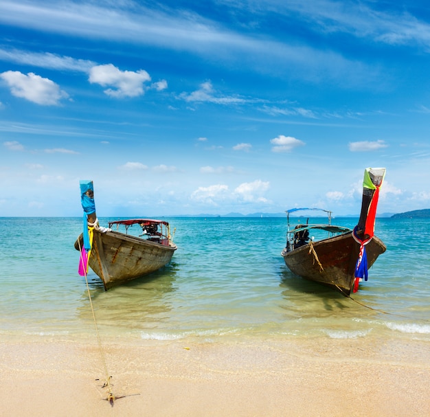 Long tail boat on beach, Thailand