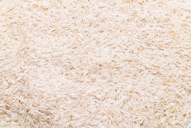 Long white rice close up, textured background